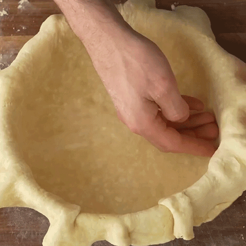 Person Making Pie Crust GIF
