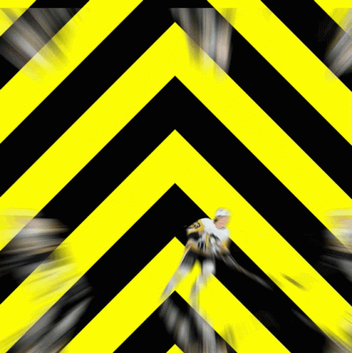 Person on Black and Yellow Striped Background