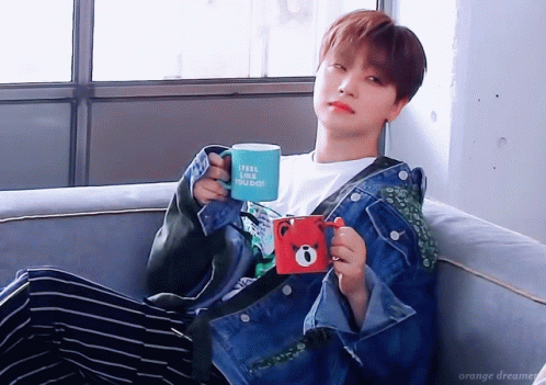 Person On Couch Holding Feel Like You Do Mug GIF