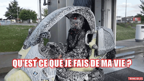 Person on Motorcycle With Qu'est Ce Que Je Fais De Ma Vie