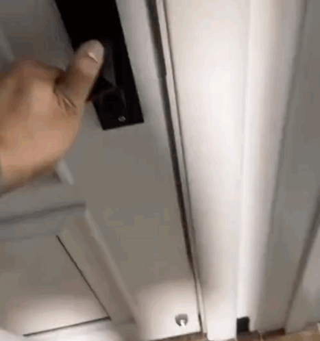 Person Opening Door With Finger