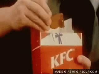 Person Opening KFC Box With Chicken Nugget