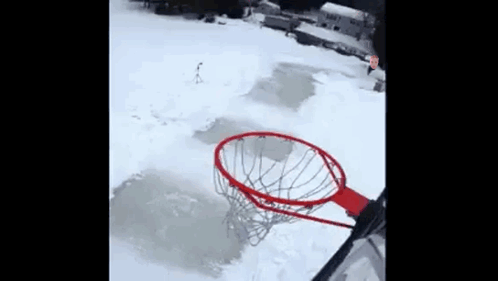 Person Playing Basketball In Snow GIF