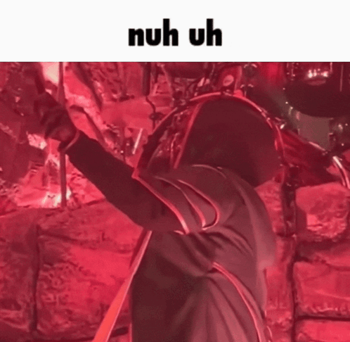 Person Playing Drum Set Saying Nuh Uh