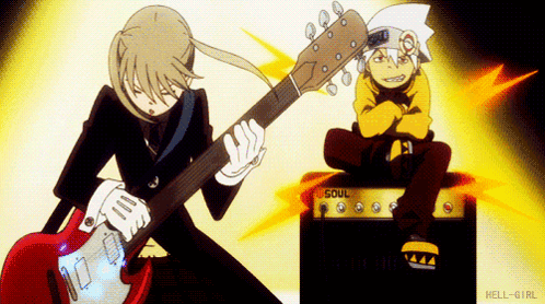 Person Playing Guitar Next to Amplifier Saying Soul