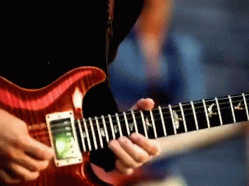 Person Playing Red Electric Guitar GIF