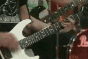 Person Playing White Guitar with L