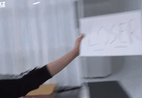Person Pointing At Exit Sign GIF
