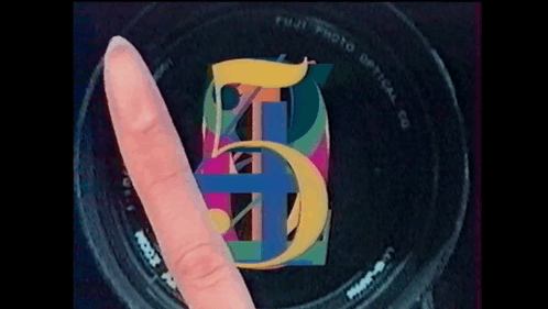 Person Pointing At Fuji Lens GIF
