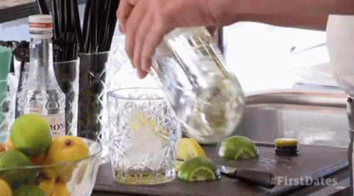 Person Pouring Drink Into Glass With First Dates