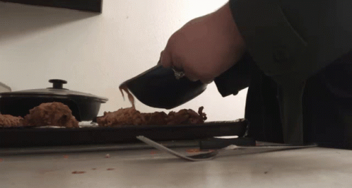 Person Pouring Into Pan