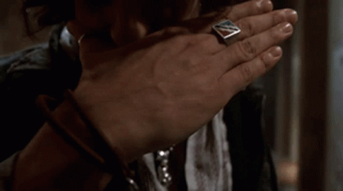 Person Praying With Ring