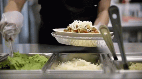 Person Preparing Buffet Plate GIF