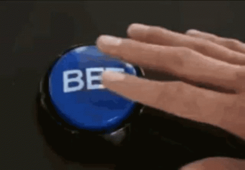 Person Pressing Blue Be Button
