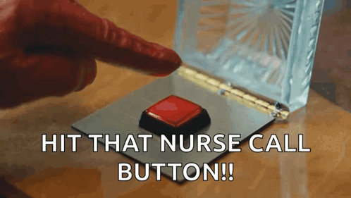 Person Pressing Red Nurse Call Button