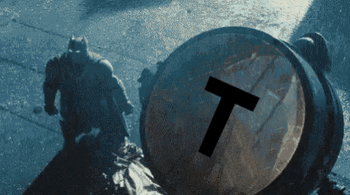 Person Pushing Barrel with T