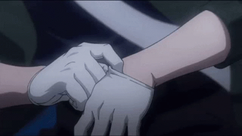 Person Putting White Gloves on Arm