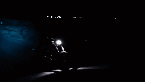 Person Riding Motorcycle On Dark Road GIF