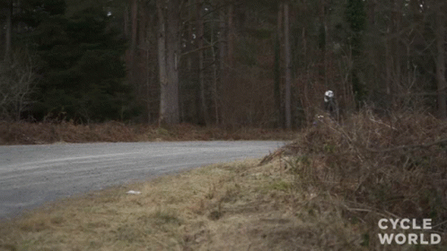 Person Riding Motorcycle on Dirt Road Cycle World