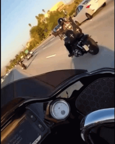 Person Riding Motorcycle on Highway Saying No