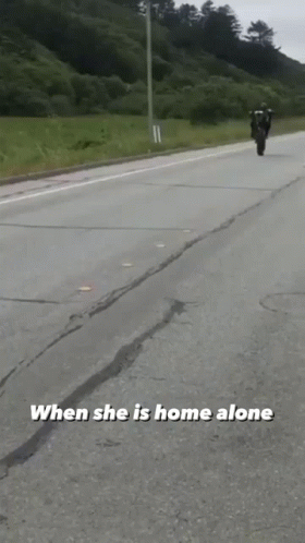 Person Riding Motorcycle When She Is Home Alone