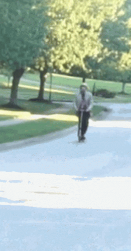 Person Riding Scooter