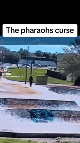Person Riding Skateboard Down Ramp Pharaohs Curse
