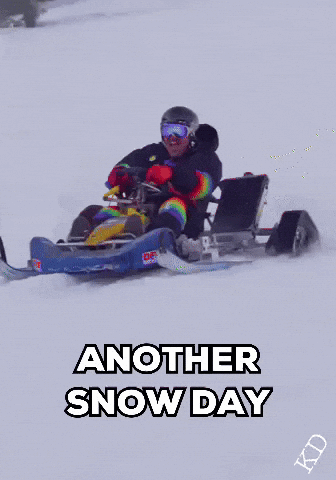 Person Riding Snowmobile With Snow Day
