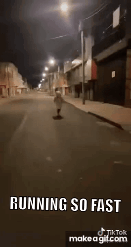 Person Running Down Street at Night Saying Running So Fast