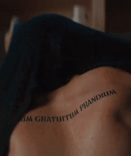 Person's Back Tattoo Close Up