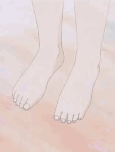 Person's Bare Feet on Sandy Surface