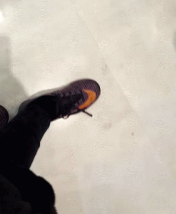 Person's Blurry Walking Feet