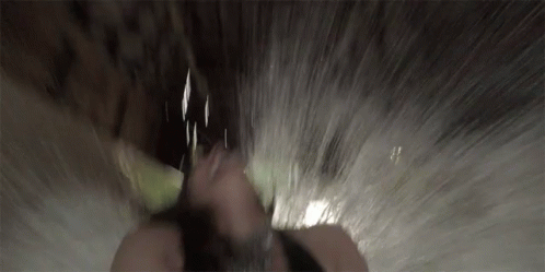 Person's Face Close Up in Waterfall