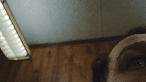 Person's Face Close Up Light Behind GIF