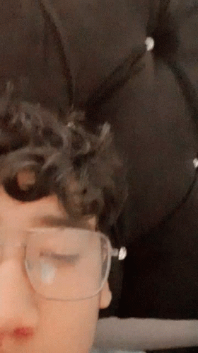 Person's Face Close Up with Glasses