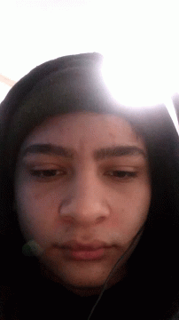 Person's Face Wearing Hooded Jacket GIF