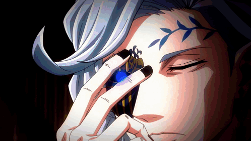 Person's Face with Black Nails and Blue Ring