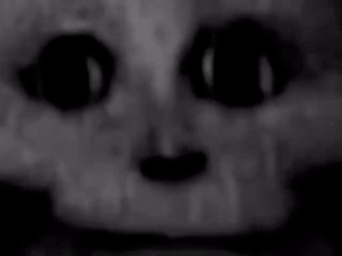 Person's Face With Glowing Eyes