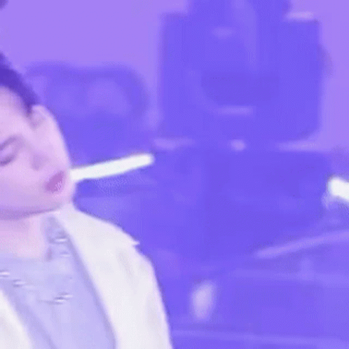 Person's Face With Light Out Of Mouth GIF