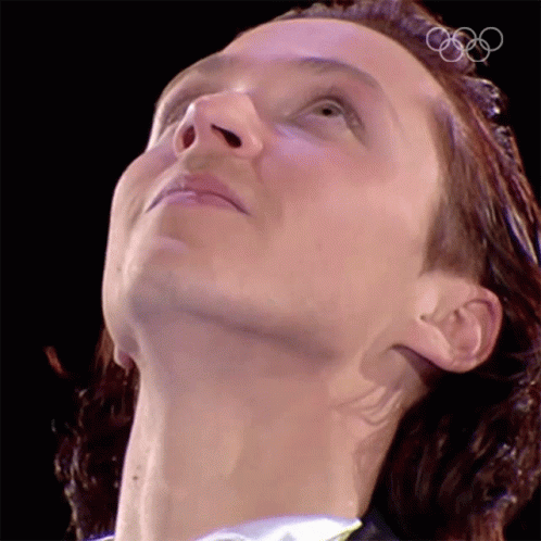 Person's Face with Olympic Rings