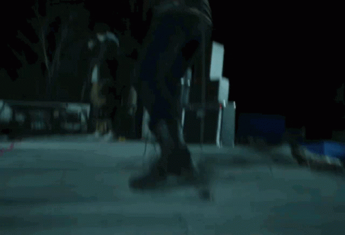 Person's Feet in Blurry Photo