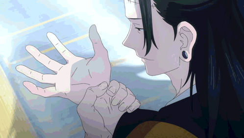 Person's Hand With Blue Earring