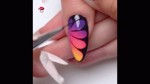 Person's Nails With Colorful Design
