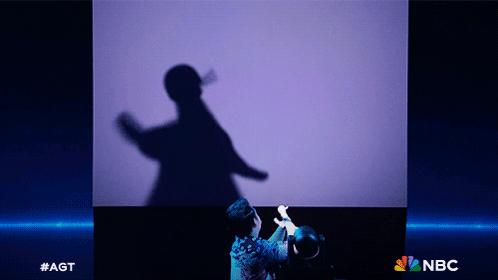 Person Shadow With NBC Logo