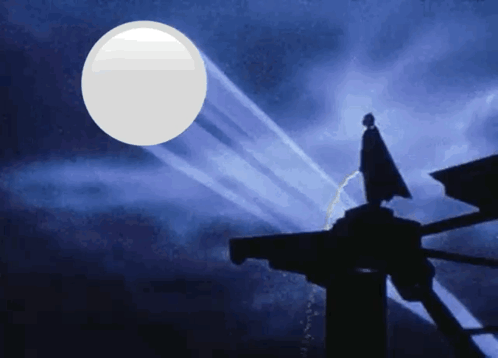 Person Silhouette On Building Under Full Moon GIF
