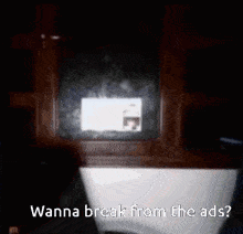 Person Sitting in Dark Room Wanna Break from the Ads