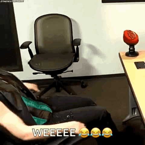 Person Sitting in Office Chair Saying Weeeee