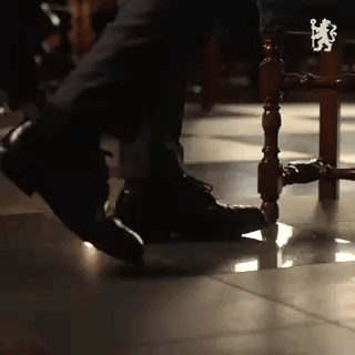 Person Sitting On Chair With Foot On Leg GIF