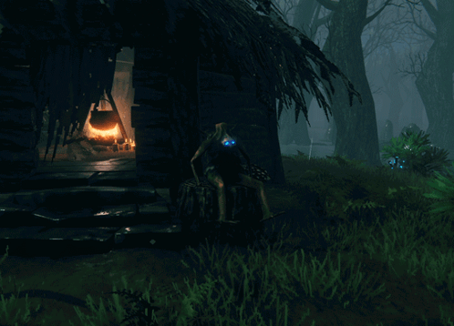 Person Sitting on Stump in Front of Hut