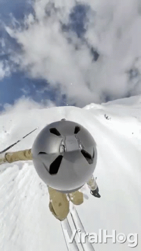 Person Skiing Down Snow Slope GIF